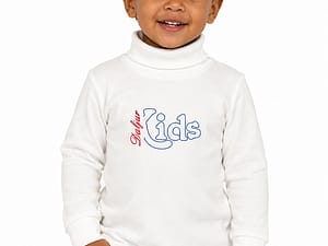 Young boy wearing a turtleneck white shirt.