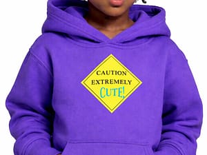 Child wearing a purple hoodie with a cute warning sign.
