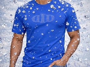 Man in blue t-shirt with water splashes around.