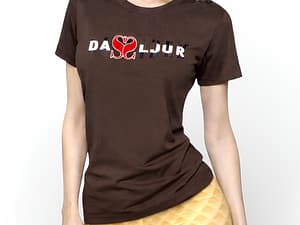 Woman wearing a brown Da Soul Jr t-shirt with yellow patterned pants.